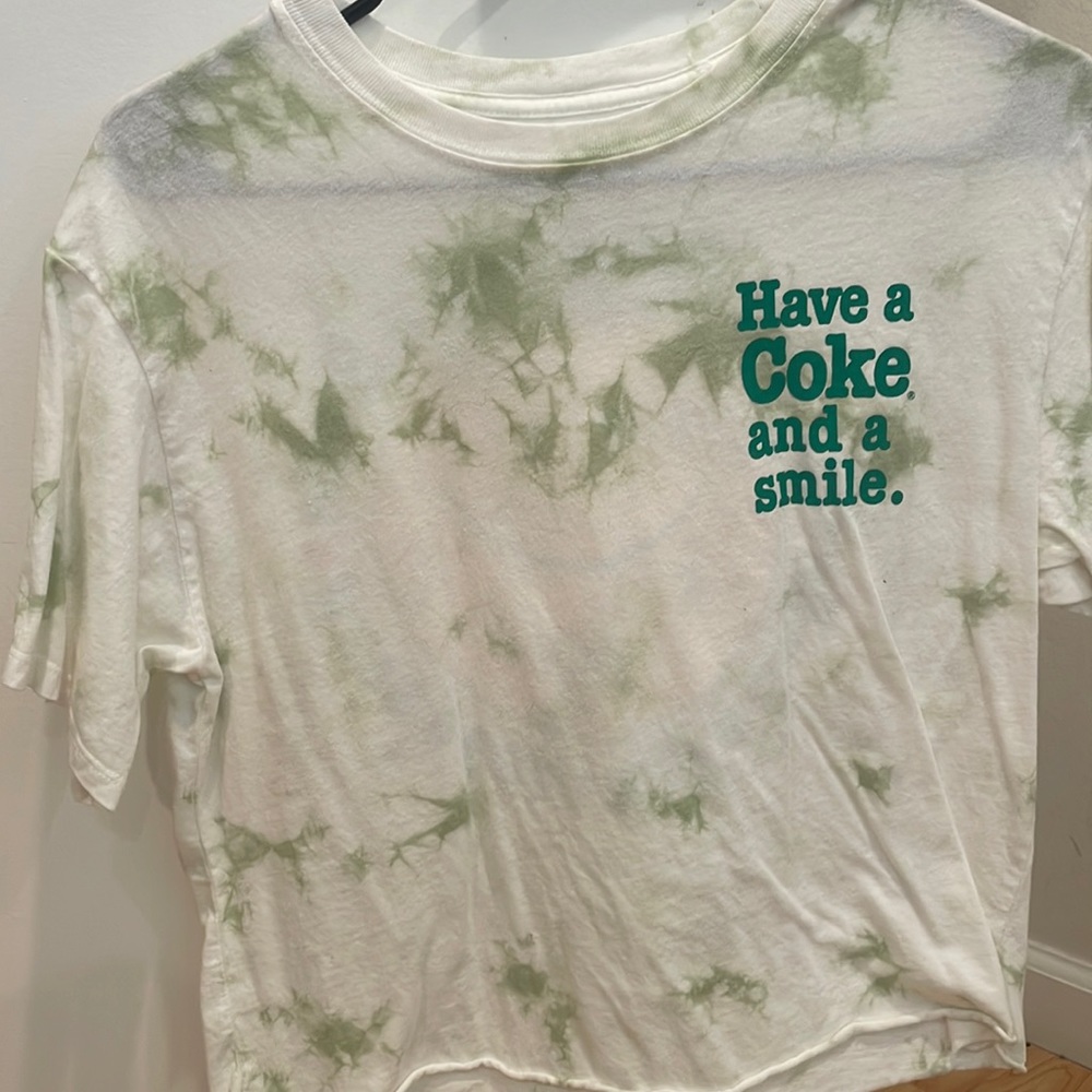Coke T-shirt and smile